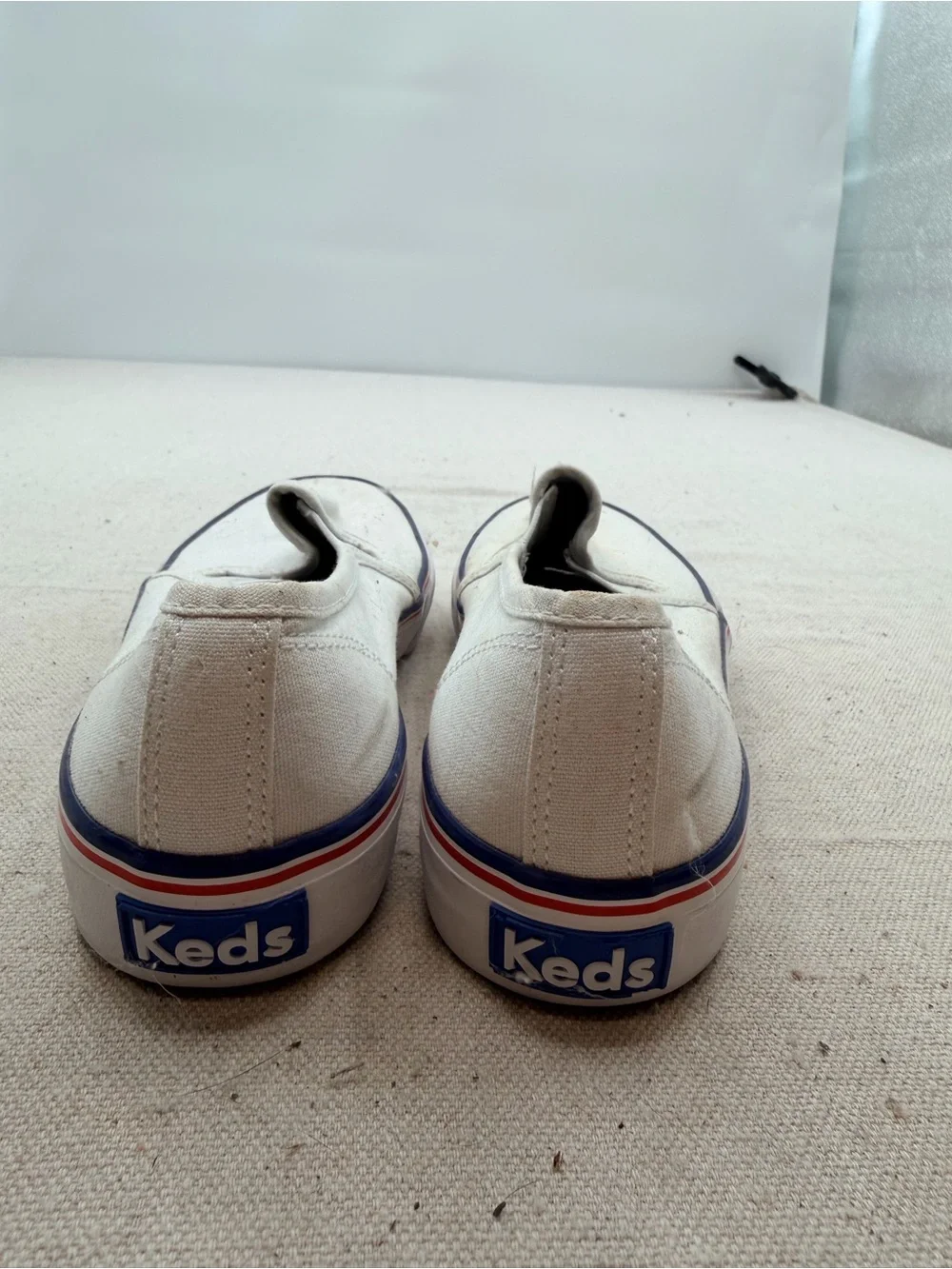 Keds White Canvas Slip-On Loafers with Red & Blue Trim